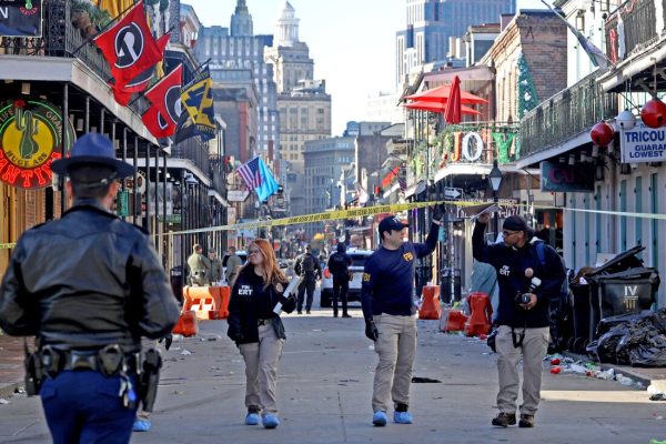 NEW ORLEANS, LOUISIANA - JANUARY 1: Law enforcement officers from multiple agencies work the scene on Bourbon Street after at least ten people were killed when a person allegedly drove into the crowd in the early morning hours of New Year's Day on January 1, 2025 in New Orleans, Louisiana. Dozens more were injured after a suspect in a rented pickup truck allegedly drove around barricades and through a crowd of New Year's revelers on Bourbon Street. The suspect then got out of the car, opened fire on police officers, and was subsequently killed by law enforcement. (Photo by Michael DeMocker/Getty Images)